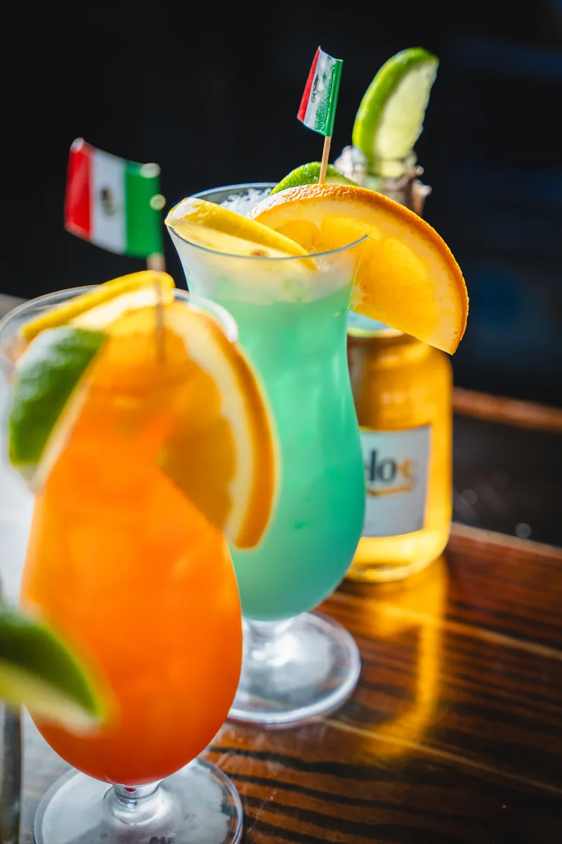 A colorful lineup of hand-shaken margaritas